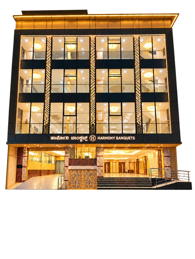 Harmony Banquets illuminated front elevation, entrance, steps and railings on a transparent background.